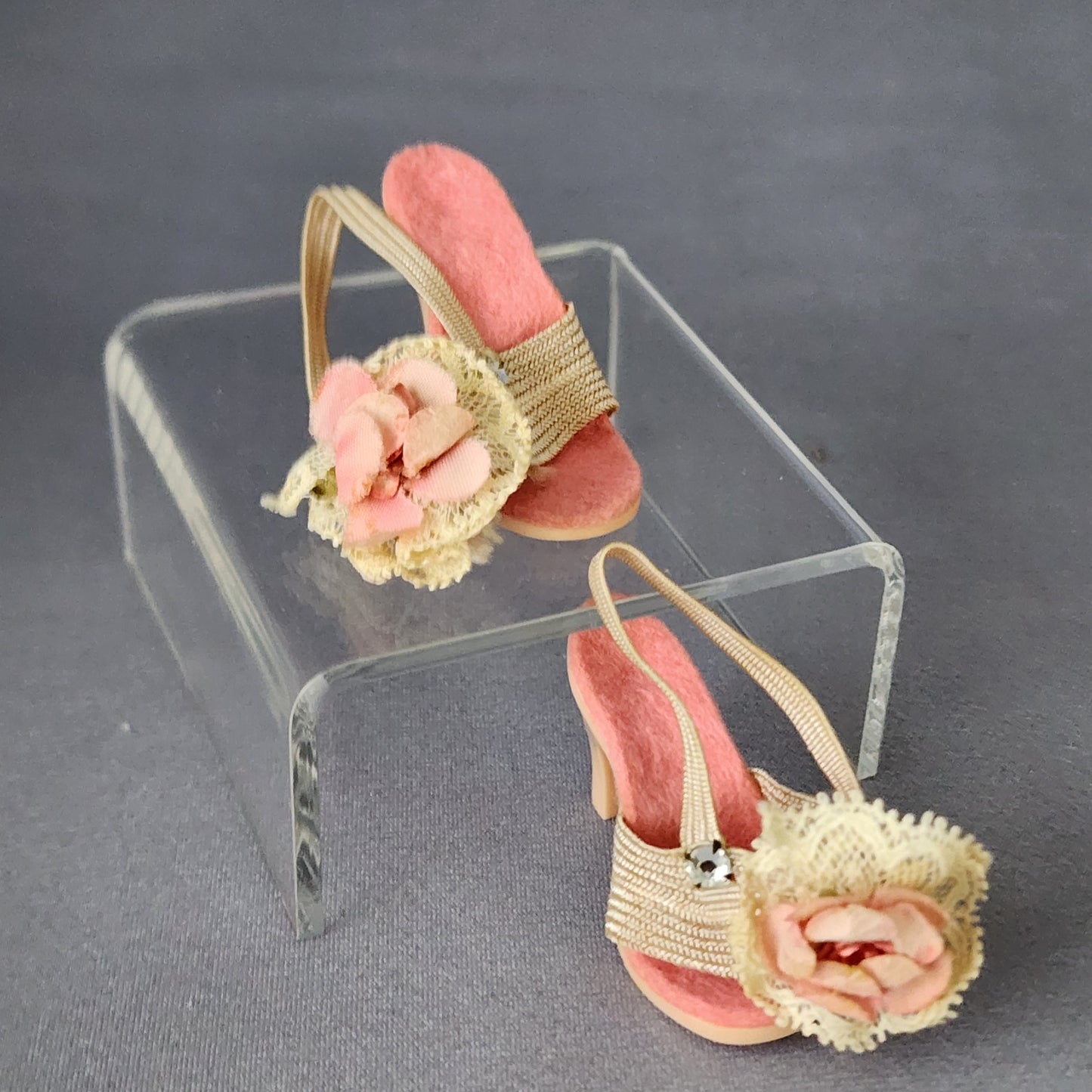 Pink mules, stretched elastic