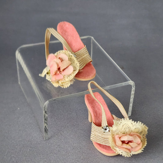 Pink mules, stretched elastic
