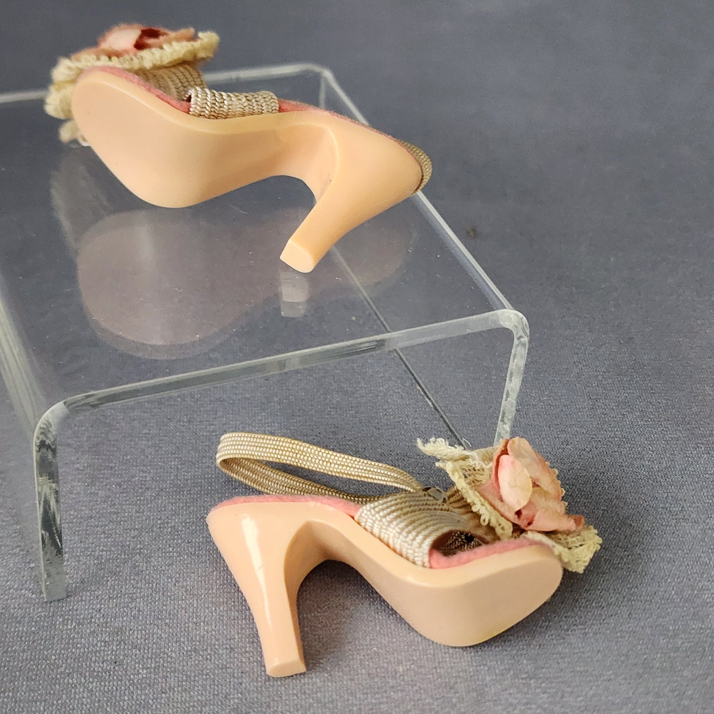 Pink mules, stretched elastic